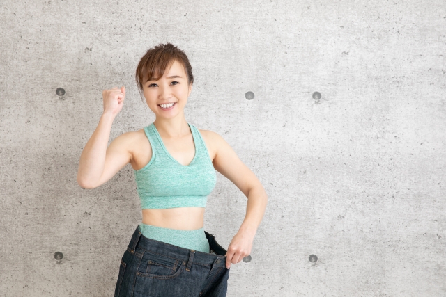 スポーツウェア（運動着）の女性（ダイエット成功イメージ）